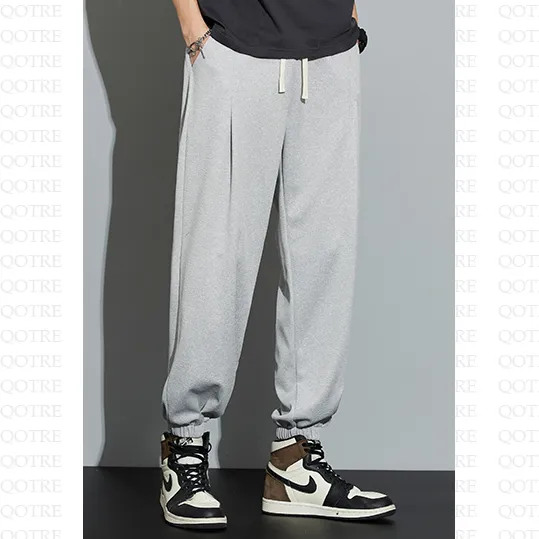 Knitted Solid Color Casual Tapered Loose Fit Sweatpant