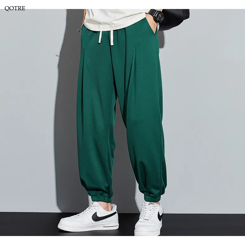 Knitted Solid Color Casual Tapered Loose Fit Sweatpant