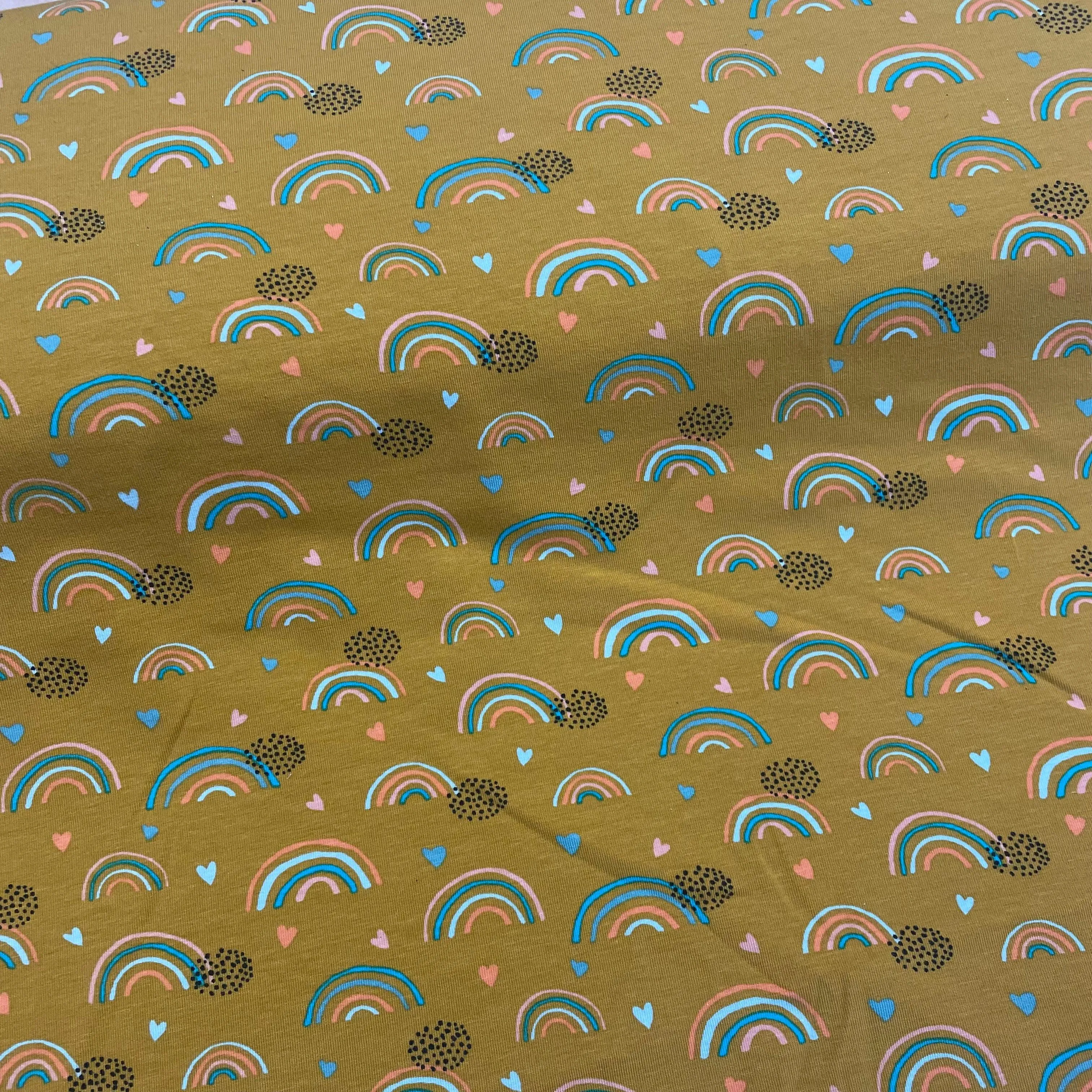 Rainbows on Ocre GOTS Organic Cotton Jersey Fabric